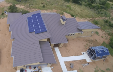 Aerial view of new home build with installed solar panels