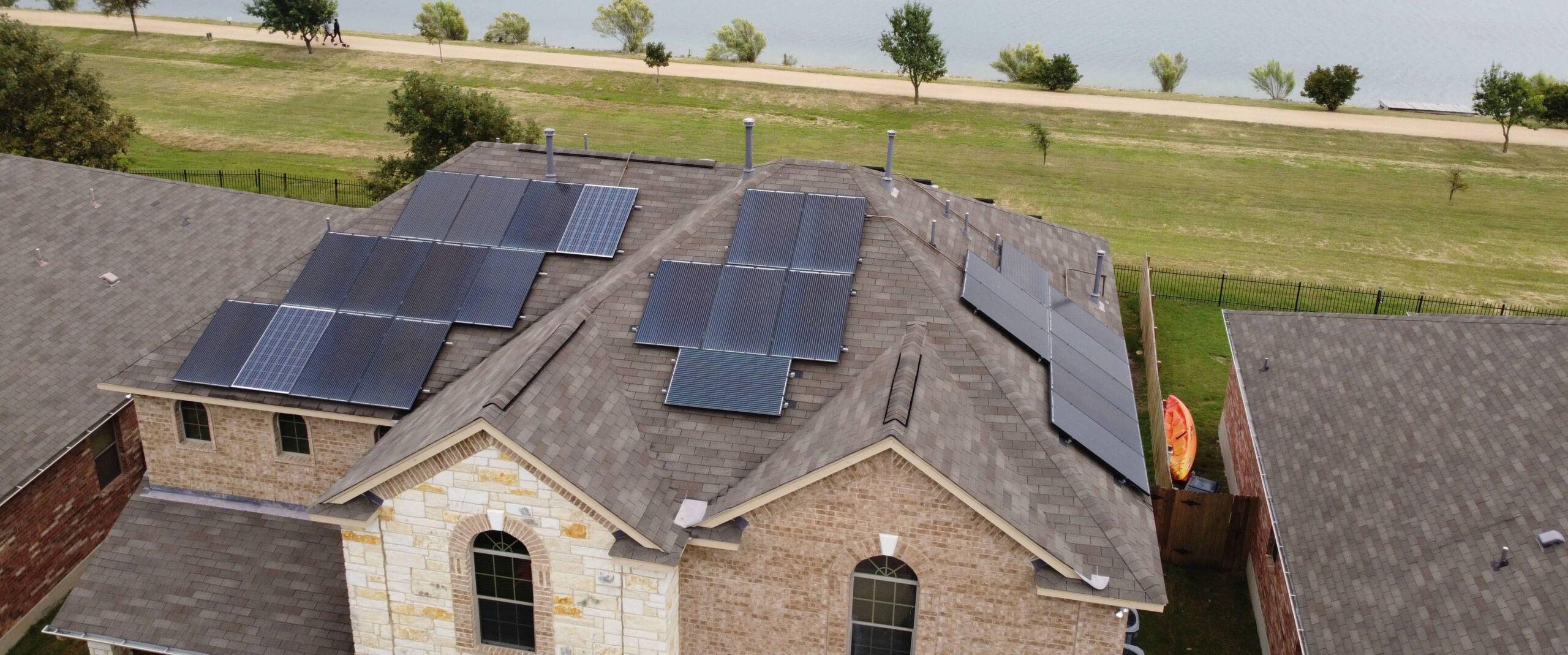 Aerial view of home with solar panels installed